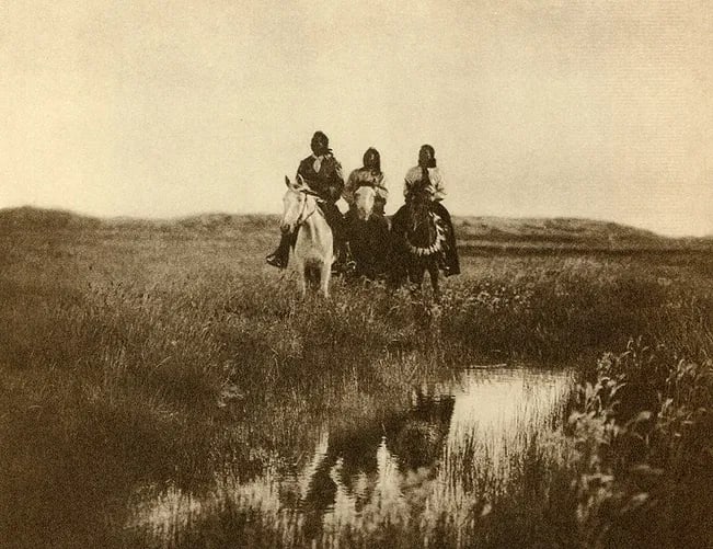 Curtis, Edward S - In The Land Of The Sioux: Photogravure printed in 1973. A sweeping landscape documenting the Sioux nation. Image size: approx. 7.5" x 10"., Mounted to archival board
