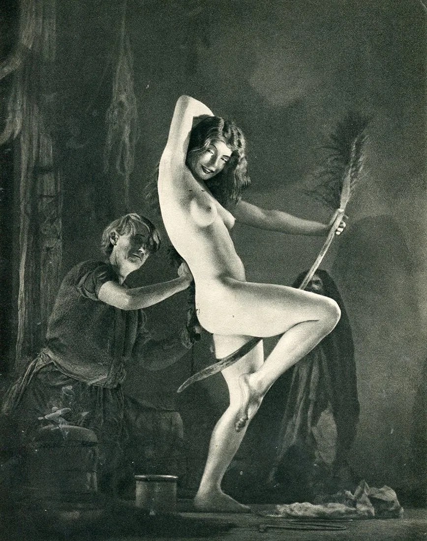 Mortensen, William - Preparation For The Sabbot: Vintage Sheet-fed Gravure. A dark, theatrical "grotesque" study from the master of pictorialism. Image size: approx. 7" x 9"., Mounted to archival board
