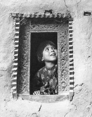Ali, SH. Riaz - Girl In Window: Vintage Sheet-fed Gravure. A moody, atmospheric pictorialist study. Image size: approx. 8.5" x 11.5"., Mounted to archival board