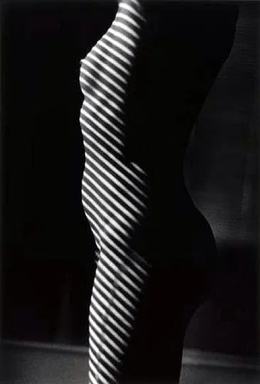 Gibson, Ralph - Nude With Stripes: Vintage Sheet-fed Gravure. Signature Gibson high-contrast lighting and shadow. Image size: approx. 8" x 12"., Mounted to archival board