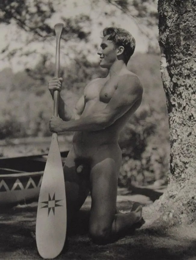 Bruce Weber - John at the Campground on Bear Pond, 1990: BRUCE WEBER (b. 1946), John at the Campground on Bear Pond, 1990, Sheet-fed gravure c. 1990, Printed in United States of America, 9 3/8" x 7 1/4", Mounted to archival board