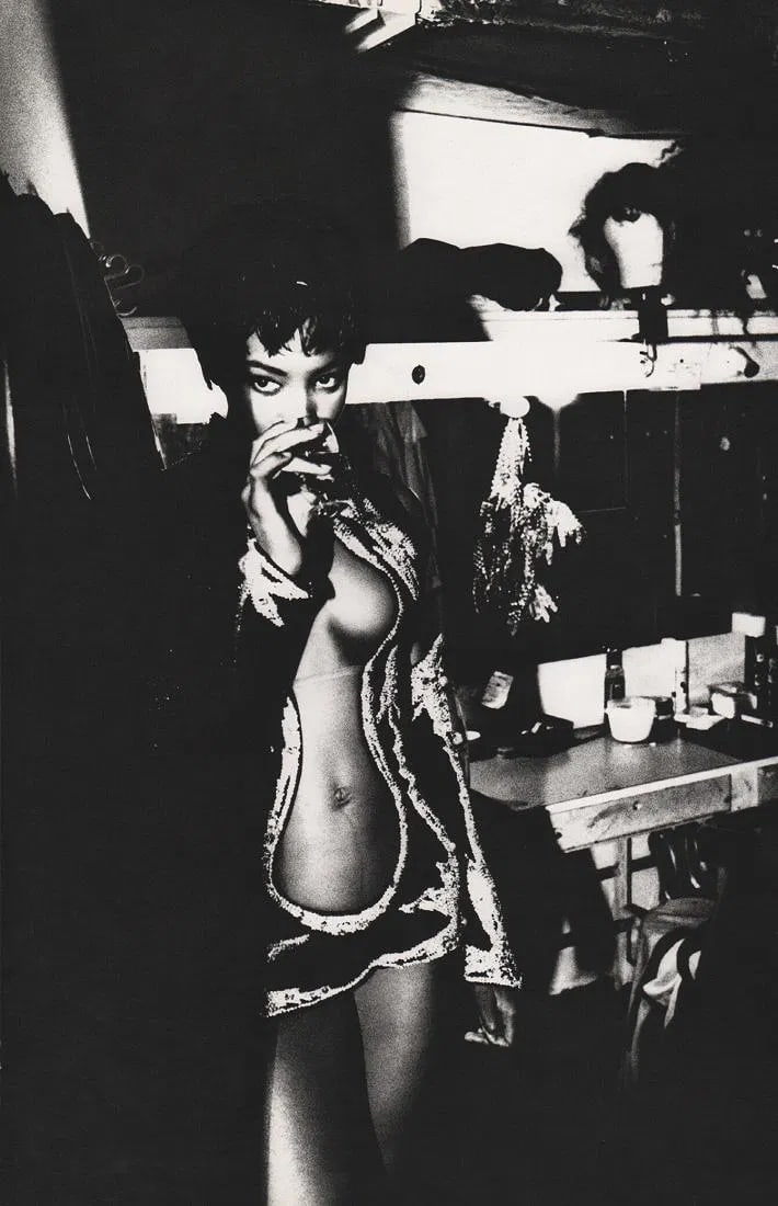 Von Unwerth, Ellen - Naomi At The Alcazar: Sheet-fed Gravure from the 1990s. High-fashion cinematic study of Naomi Campbell. Image size: approx. 8.5" x 11"., Mounted to archival board