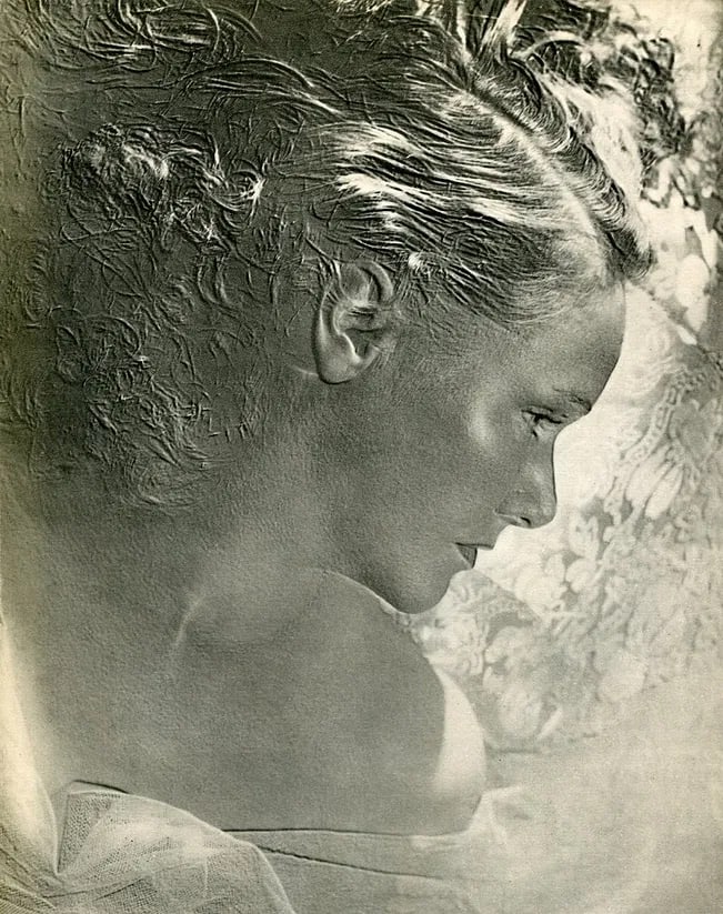 Koruna, Paul - Portrait Decale: Vintage Sheet-fed Gravure. Modernist portraiture using off-center framing and shadow. Image size: approx. 8" x 11"., Mounted to archival board