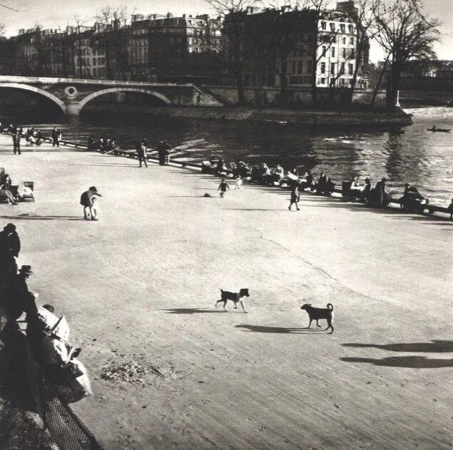 Boubat, Edouard - The Pont-Marie - Paris 1948: Vintage Sheet-fed Gravure. Poetic humanist photography of Parisian life. Image size: approx. 8" x 11"., Mounted to archival board