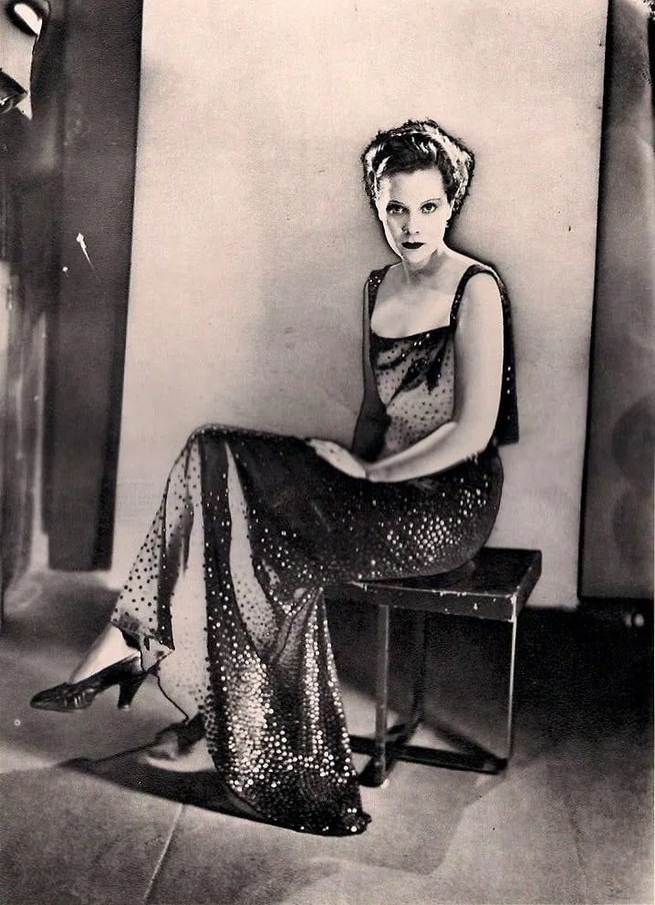 Man Ray - Fashion - Partial Solarization: 1934 Sheet-fed Gravure. Experimental darkroom technique applied to a hat study. Image size: approx. 8.5" x 11"., Mounted to archival board