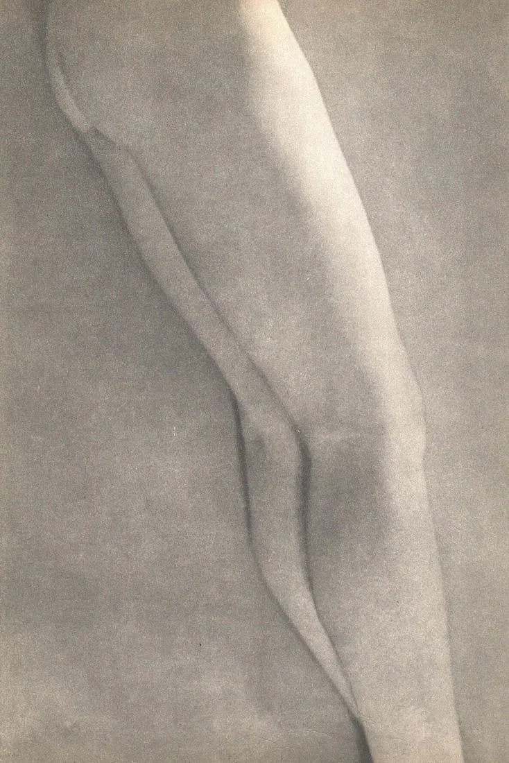 Munkacsi, Martin - Nude Legs: Vintage Sheet-fed Gravure. Kinetic fragment study of the female figure. Image size: approx. 9" x 12"., Mounted to archival board