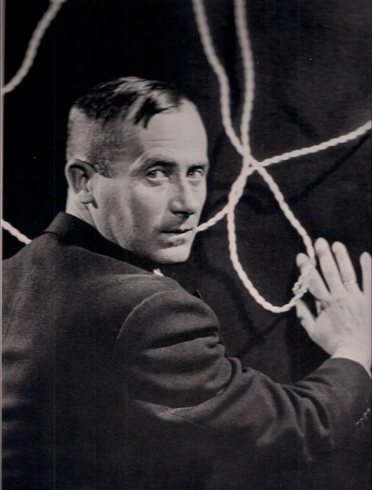 Man Ray - Joan Miro, 1930: 1934 Sheet-fed Gravure. A sharp Surrealist portrait of the painter. Image size: approx. 8.5" x 11"., Mounted to archival board