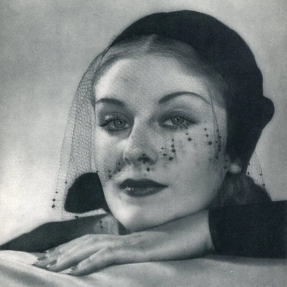 Meerson, Harry O - Portrait W/Veil: Vintage Sheet-fed Gravure. A sophisticated example of French glamour lighting. Image size: approx. 8.5" x 11.5"., Mounted to archival board