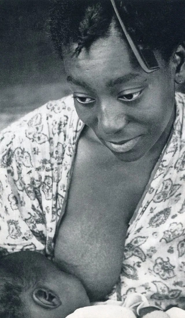 Newman, Arnold - Mother And Baby: Vintage Sheet-fed Gravure. Minimalist, character-driven documentary study. Image size: approx. 8" x 10.5"., Mounted to archival board