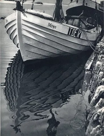 Feininger, Andreas - Boat Reflection: Vintage Sheet-fed Gravure. Graphic study of water and industrial form. Image size: approx. 8.5" x 11"., Mounted to archival board