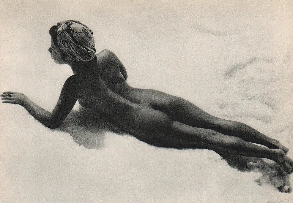 Kira Sugiyama - Nude Laying On Snow: Vintage Sheet-fed Gravure. A striking contrast study from the Japanese master. Image size: approx. 8.5" x 11"., Mounted to archival board