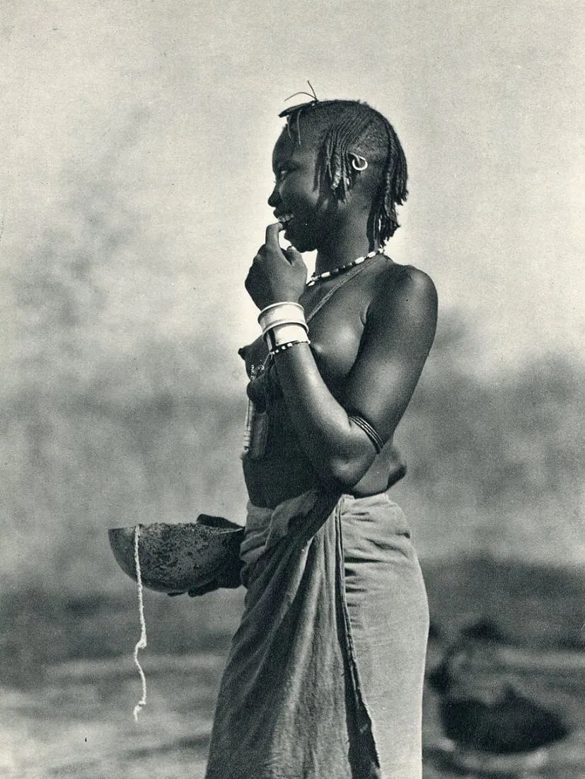 H.A. Bernatzik - Eliri Mountain Maiden, Africa: Vintage Sheet-fed Gravure from the 1930s. Important ethnographic documentation. Image size: approx. 8.5" x 11"., Mounted to archival board