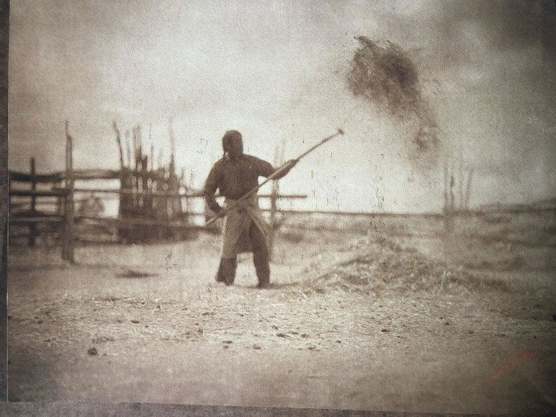 Edward Curtis - Winnowing Wheat, 1905: Photo-Litho printed later in the 20th Century. Documentation of traditional agricultural labor. Image size: approx. 6" x 8"., Mounted to archival board