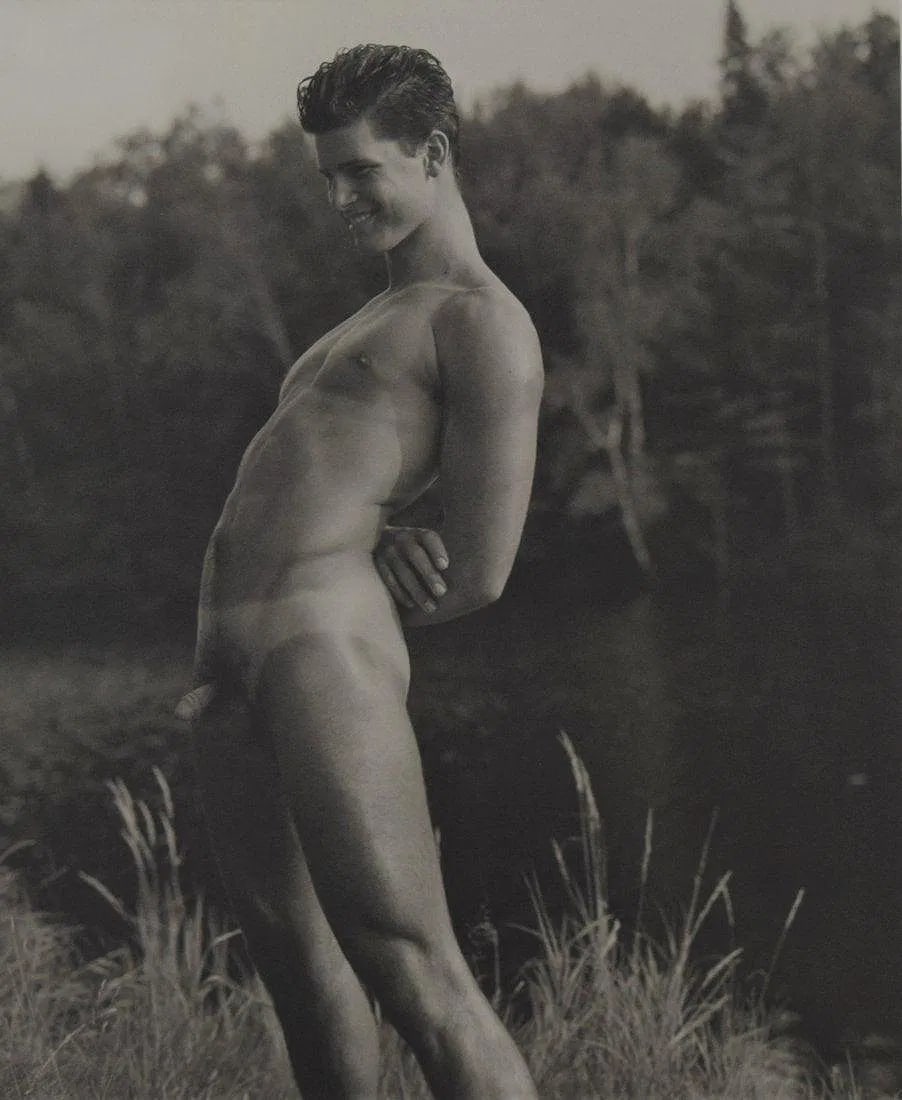 Bruce Weber - Rob at the Lean-to on the St. Regis River: BRUCE WEBER (b. 1946), Rob at the Lean-to on the St. Regis River, 1989, Sheet-fed gravure c. 1990, Printed in United States of America, 9 3/8" x 7 1/4", Mounted to archival board