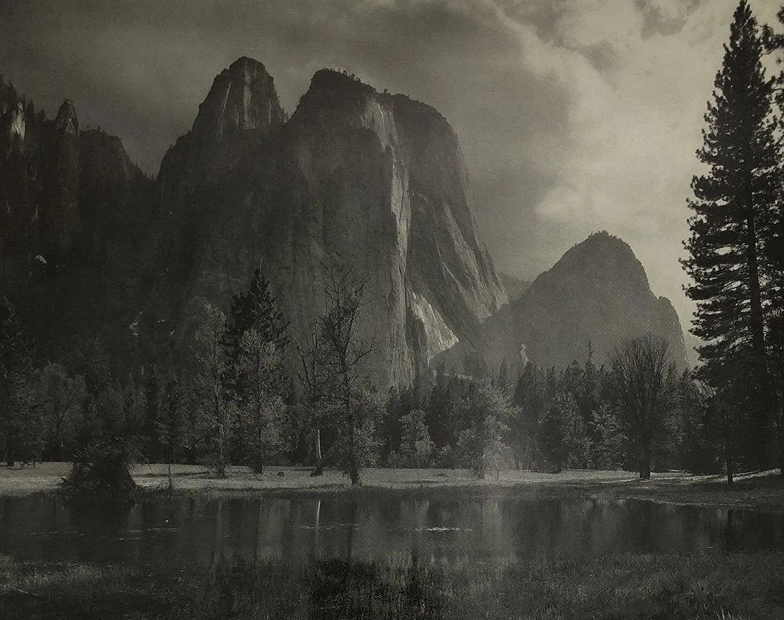 Ansel Adams - Cathedral Rocks, Afternoon Storm: ANSEL ADAMS (B.1902-1984), Cathedral Rocks, Afternoon Storm, Black and white photo on glossy paper, 7 1/2" x 9 1/2", Printed second half of 20th Century , Mounted to archival board