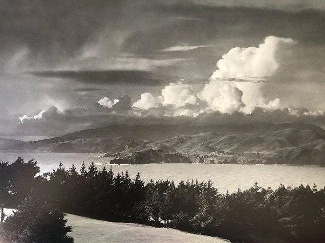 Ansel Adams - Golden Gate Headlands, California c.1950: ANSEL ADAMS (B. 1902-1984), Golden Gate Headlands, California c.1950, Photo-Litho, 11.5" x 14.5", Printed second half of 20th Century , Mounted to archival board