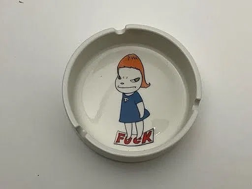 YOSHITOMO NARA 'F UCK' CERAMIC ASHTRAY: Yoshitomo Nara 'Fuck ceramic ashtray. Measures 4" x 4" x 1/4".