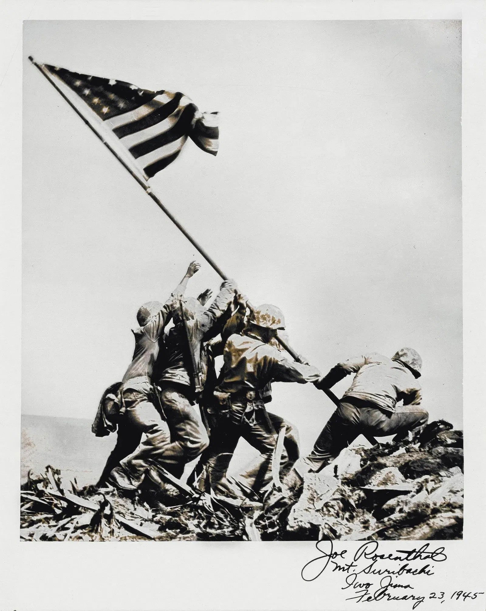 JOSEPH ROSENTHAL, Photographic print of Raising the Flag on Iwo Jima: [WORLD WAR II.] ROSENTHAL, Joseph. Photographic print of Raising the Flag on Iwo Jima, plate inscribed and signed: "Joe Rosenthal Mt. Suribachi Iwo Jima February 23, 1945." Printed later, measures 8