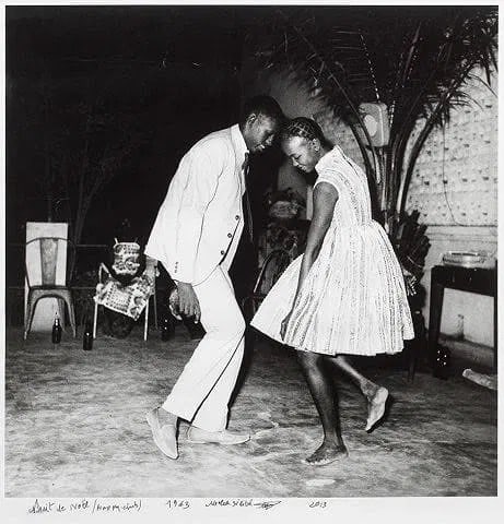 Malick Sidibé (Malian, 1935-2016)Nuit de Noël: Malick Sidibé (Malian, 1935-2016)Nuit de Noël . Plate signed and titled . Measures 18.75 x 18.25 inches