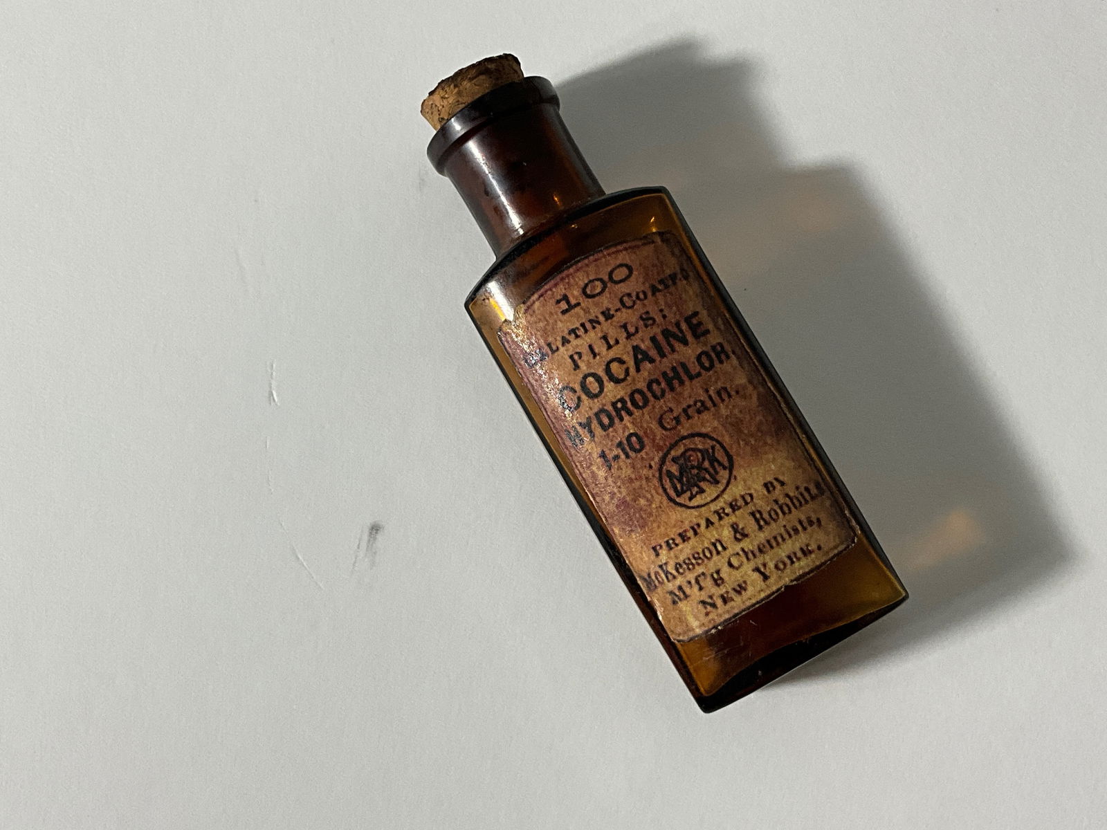 Cocaine Pharmaceutical Bottle: Cocaine pharmaceutical bottle, measures 4.25 inches tall.
