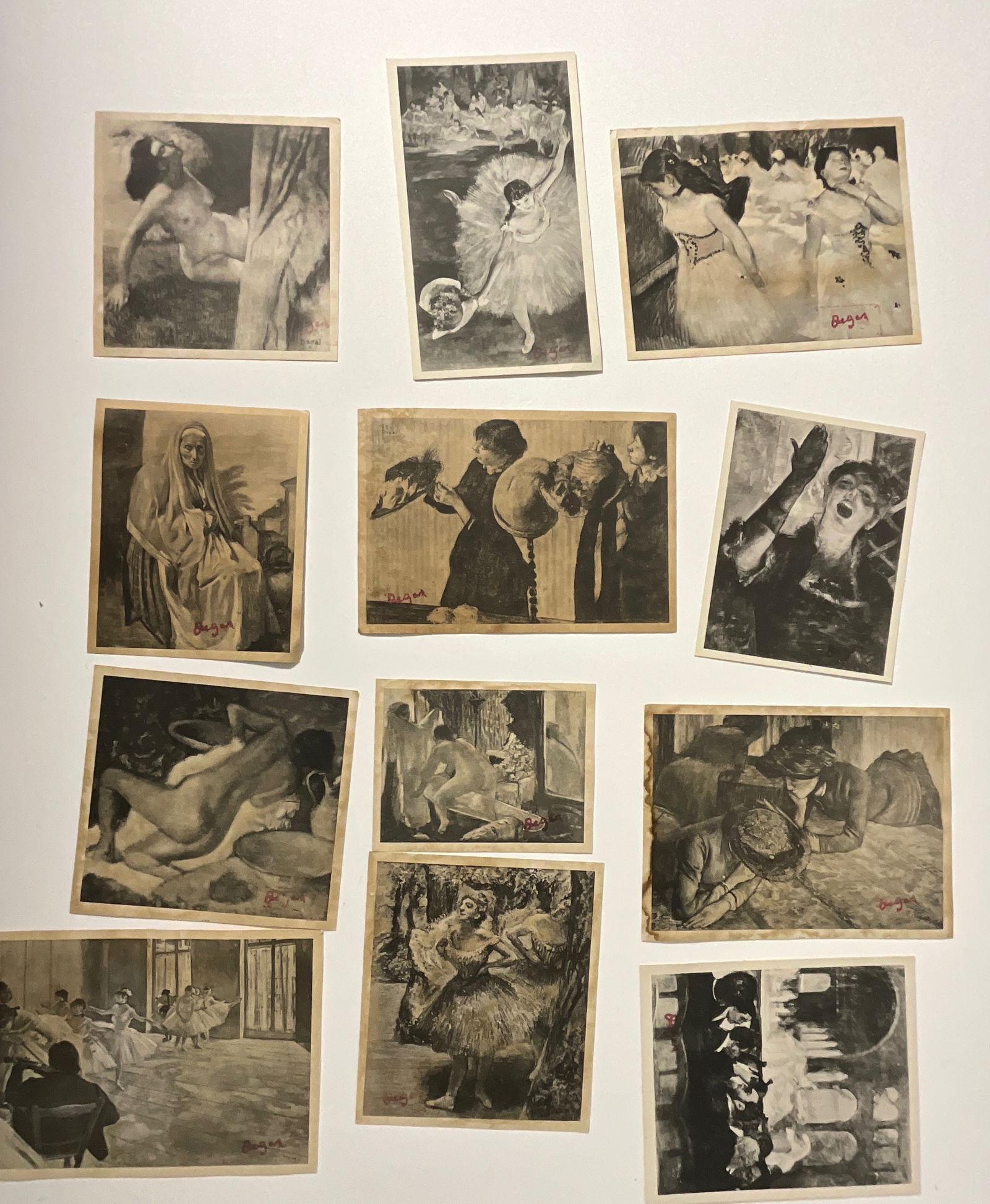 Degas Prints (Grouping of 12): Grouping of 12 vintage Degas prints, each with red Degas signature stamp, each measures approx 8 x 6 inches.