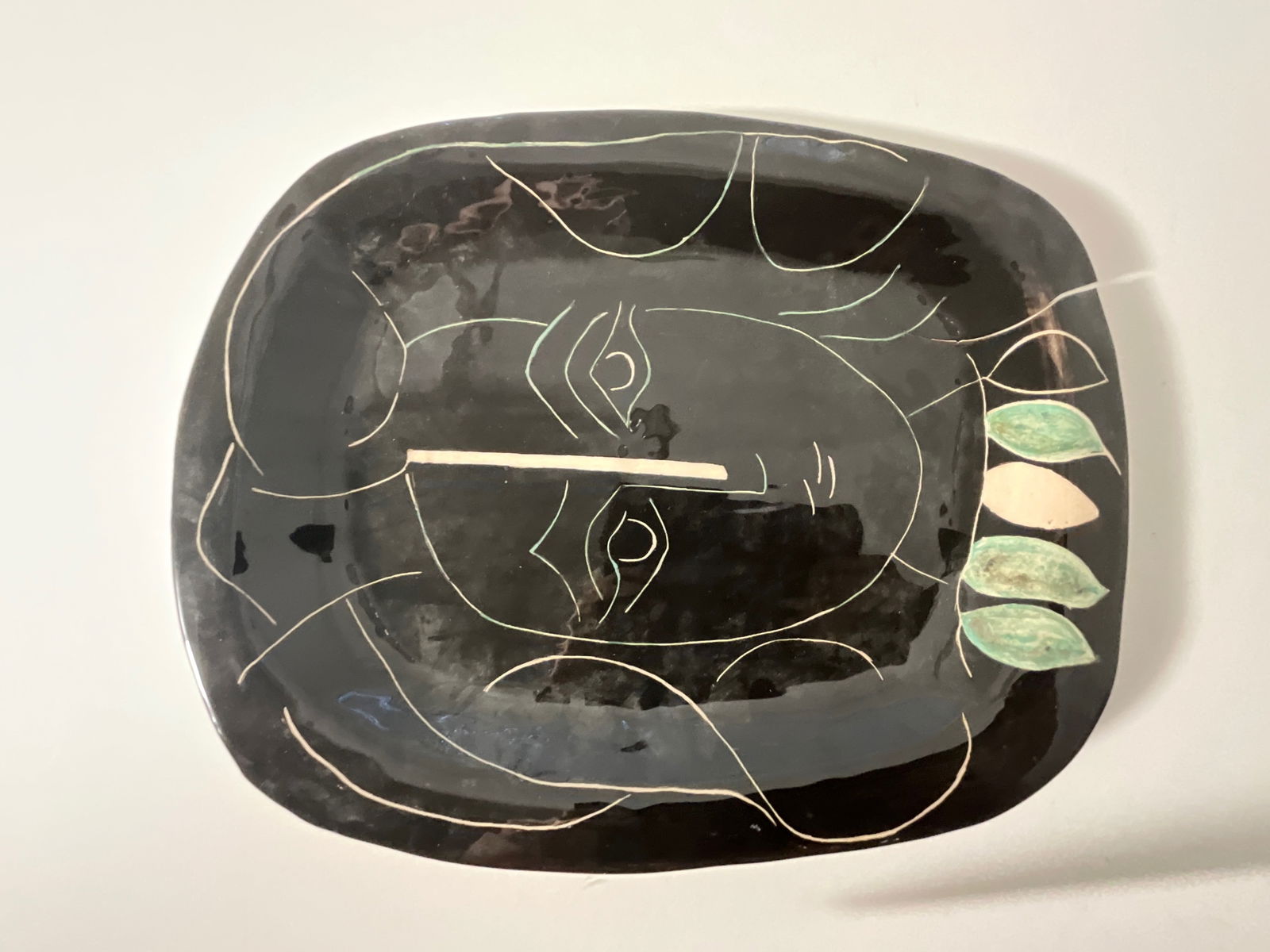 Picasso Ceramic (Cracked): Picasso Ceramic, measures 16.5 x 13.5 inches, sold as is, cracked.