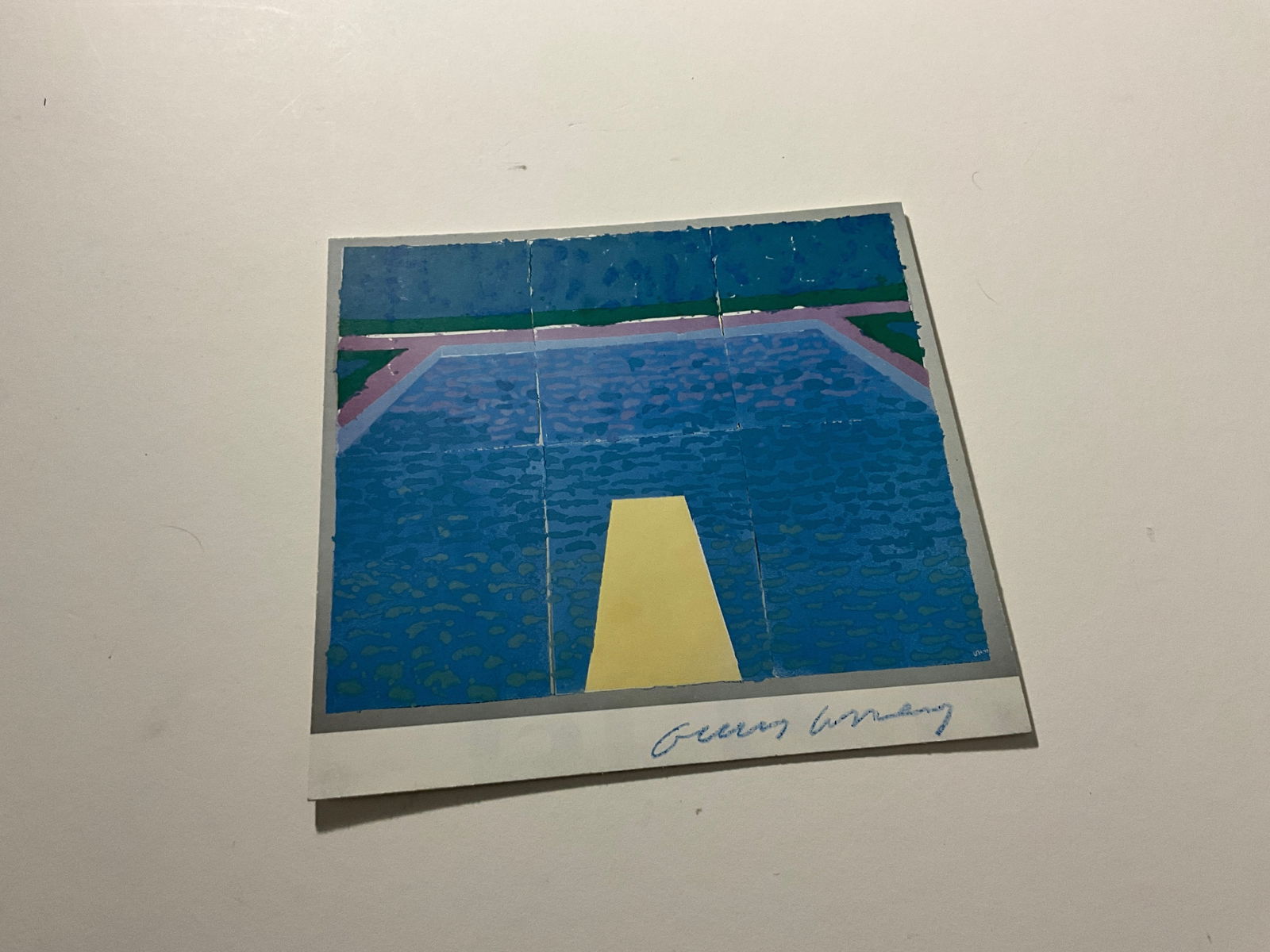 David Hockney: Swimming Pool: David Hockney "Swimming Pool," measures 9 x 8.5 inches, signed lower right by the artist in blue pastel.