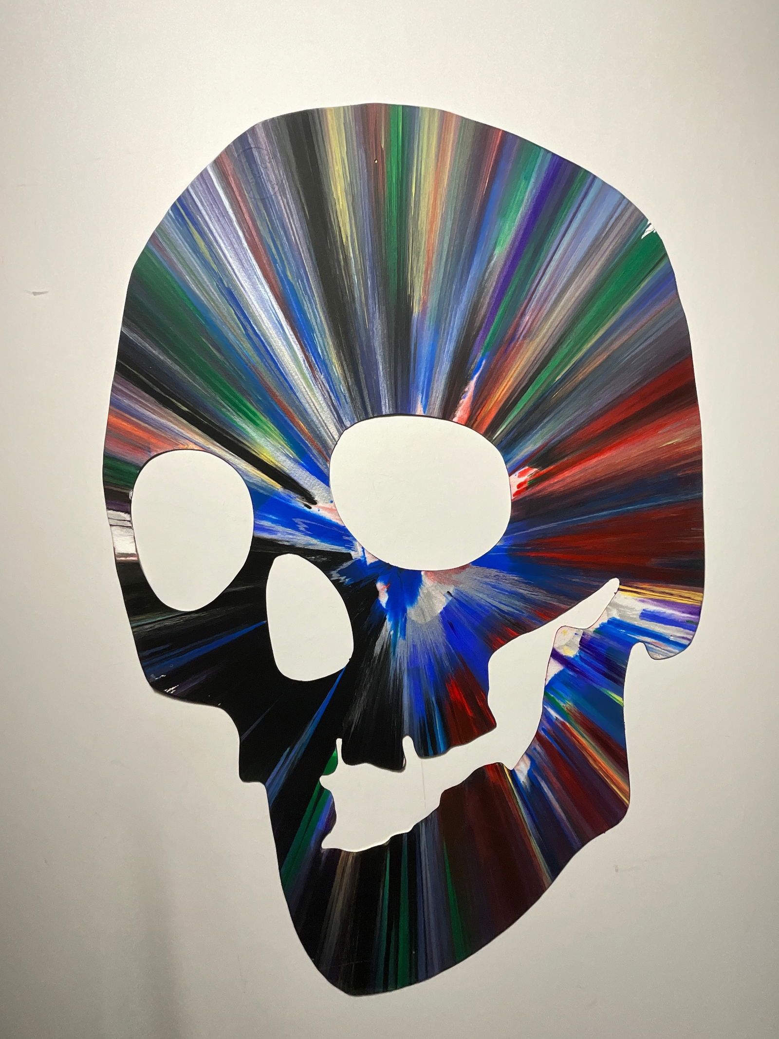 Damien Hirst: Skull Spin Painting: Damien Hirst Skull Spin Painting, measures 28.5 x 19.5 inches.