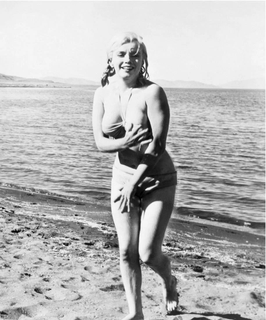 Photograph of Marilyn Monroe on the beach: Measures 10 x 8 inches, photo print on glossy paper, mounted to foam board