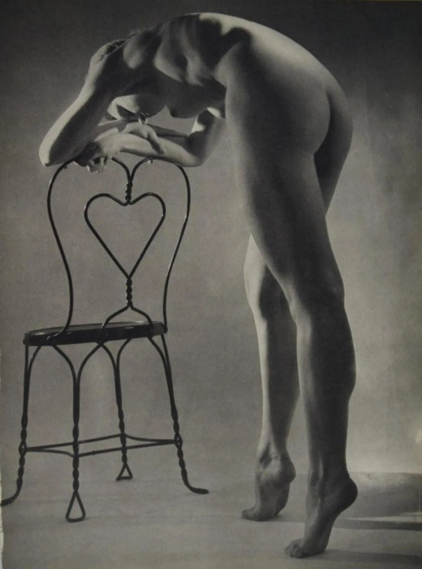 Martin Munkacsi - Nude with Chair: MARTIN MUNKACSI (1893-1963) Nude with Chair Photogravure c. 1951, mounted to archival board