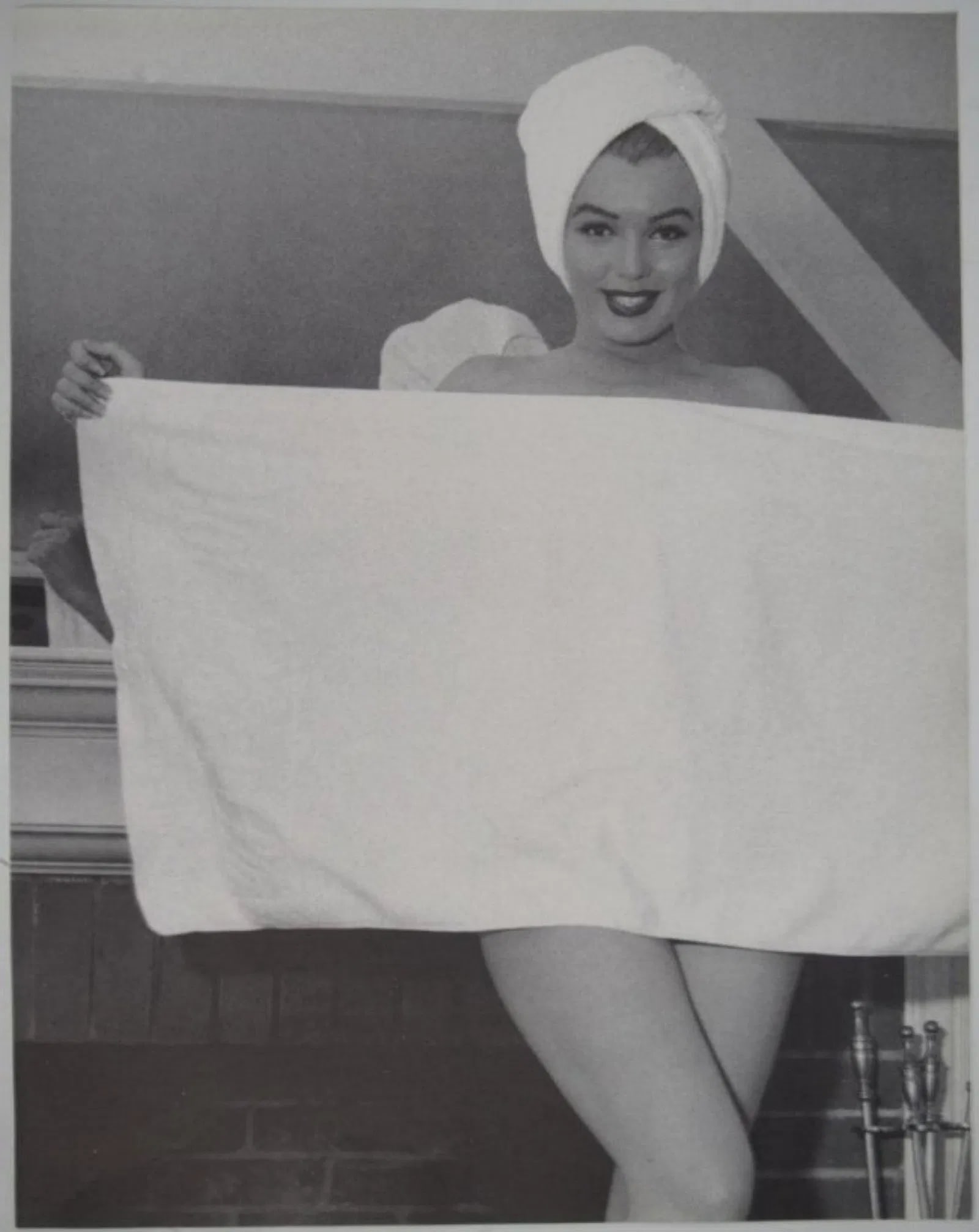 Andre de Dienes - Marilyn Monroe with Towel: ANDRE DE DIENES (1913-1985) Marilyn Monroe with Towel Photogravure c.1985, mounted to archival board