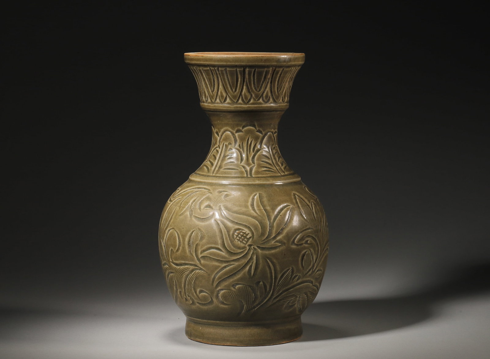 SONG DYNASTY CELADON GLAZE INCISED AND CARVED FLORAL DISH-MOUTHED VASE: Height 24cm