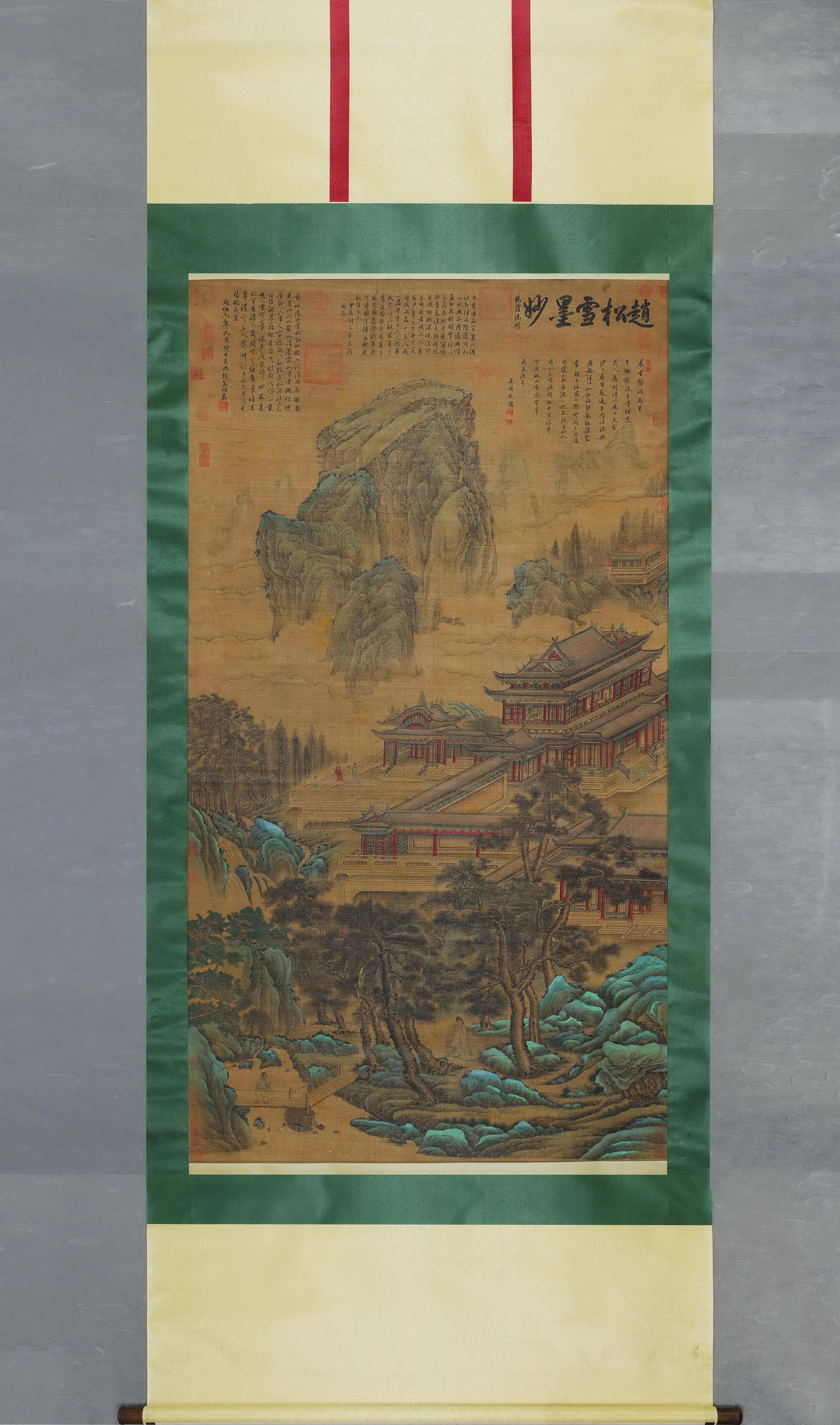 A Green-and-Blue Landscape Hanging Scroll "Immortal Palace in Spring Mist" on Silk, Attributed to: Painting Core SizeL 177cm (69.69 in); W 101cm (39.76 in)A Yuan Dynasty hanging scroll on old silk attributed to Zhao Mengfu, depicting pavilions and mountains in green-and-blue style with meticulous l