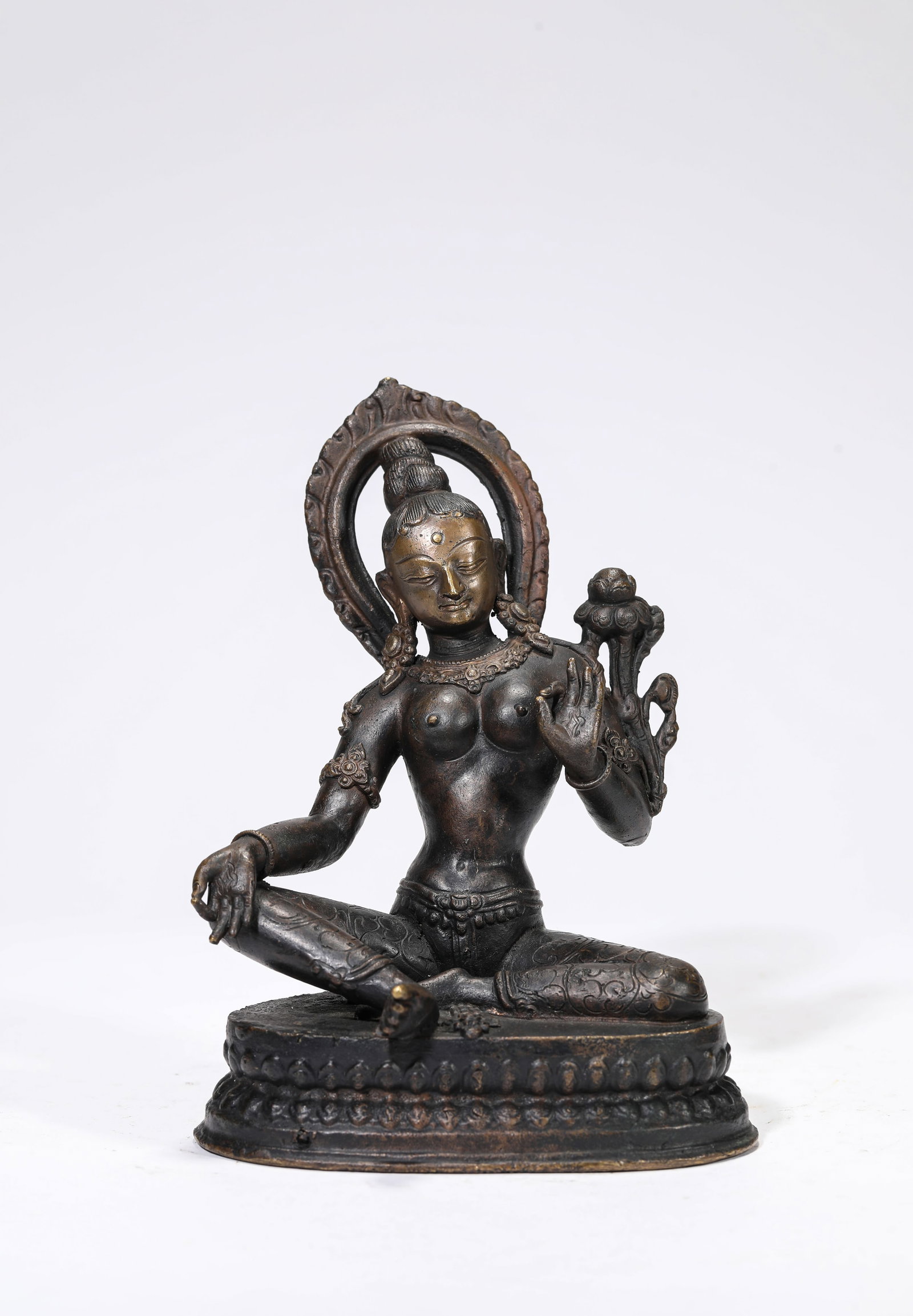 A Bronze Figure of Tara: A Bronze Figure of Tara Dimensions: Weight: 834g. Length: 12.2 cm (4.80 in) x Width: 8.6 cm (3.39 in) x Height: 16.5 cm (6.50 in). All measurements are approximate.