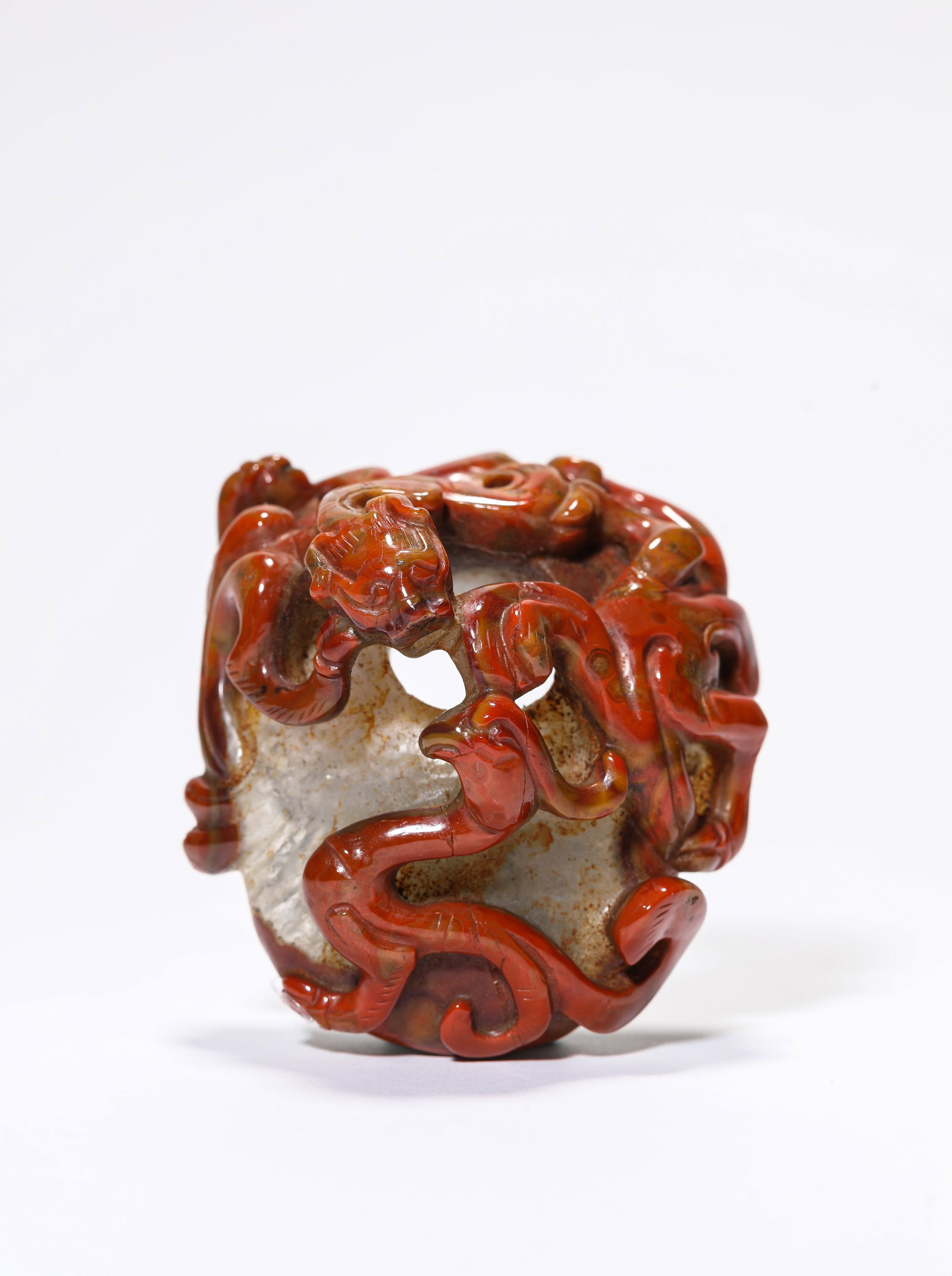 An Agate 'Dragon' 'Heart-Shaped' Pendant: An Agate 'Dragon' 'Heart-Shaped' Pendant Dimensions: Length: 6.8 cm (2.68 in) x Width: 6.1 cm (2.40 in) x Height: 3.8 cm (1.50 in). All measurements are approximate.