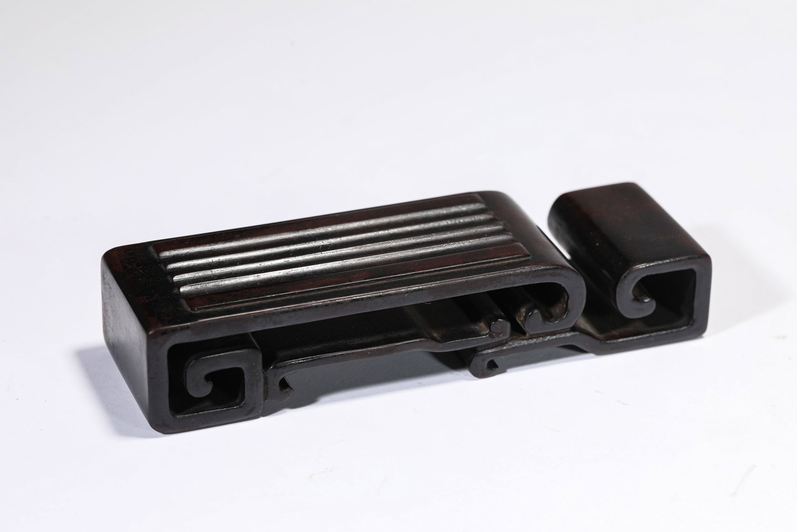 A Wood Brush Rest: A Wood Brush Rest Dimensions: Length: 13.3 cm (5.24 in) x Width: 4.0 cm (1.57 in) x Height: 2.7 cm (1.06 in). All measurements are approximate.