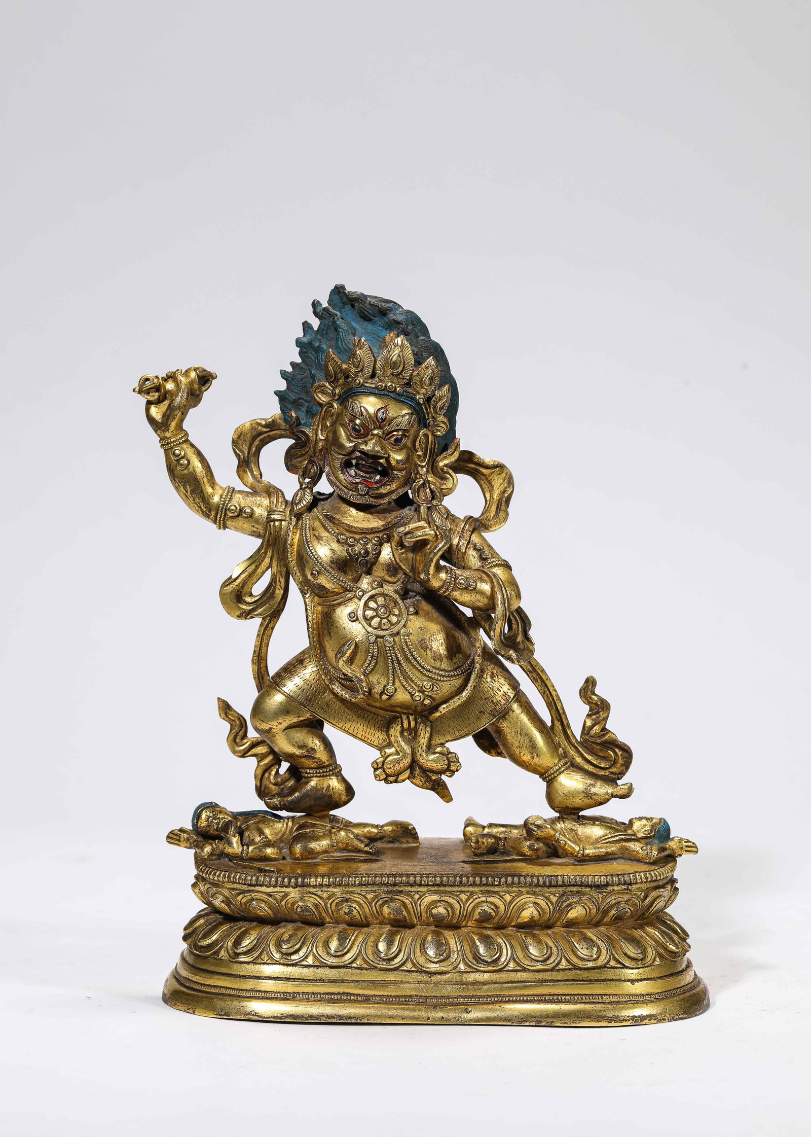 A Gilt-Bronze Figure of Vajrapani: A Gilt-Bronze Figure of Vajrapani Dimensions: Weight: 1682g. Length: 15.4 cm (6.06 in) x Width: 7.6 cm (2.99 in) x Height: 20.0 cm (7.87 in). All measurements are approximate.