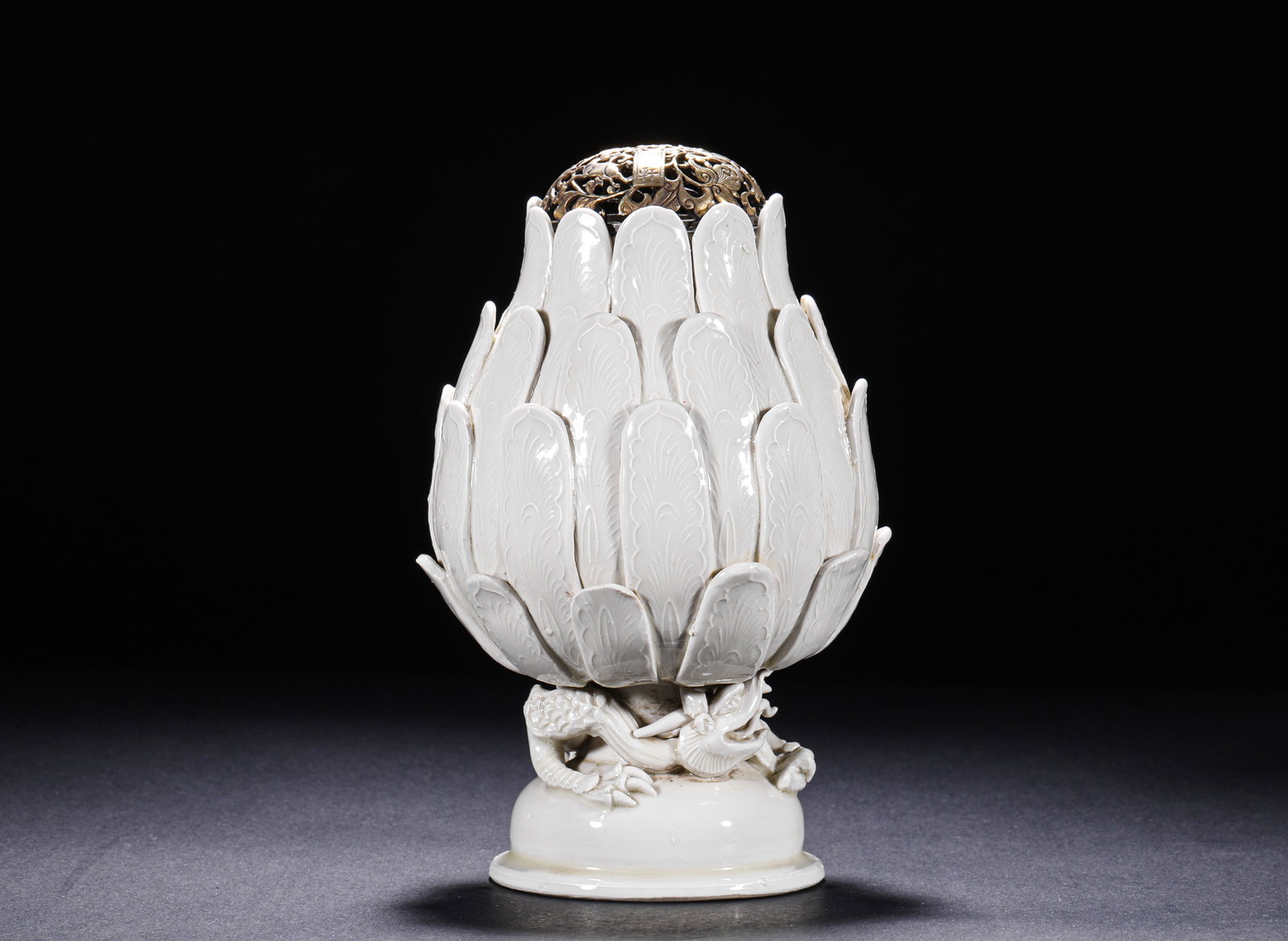 A Song Dynasty Ding-Type White-Glazed 'Lotus Petal and Dragon' Incense Burner: A Song Dynasty Ding-Type White-Glazed 'Lotus Petal and Dragon' Incense Burner H:175cm(68.90in) W:11cm(4.33in)This incense burner is made of Ding Kiln white porcelain, with a warm and pure glaze. The w