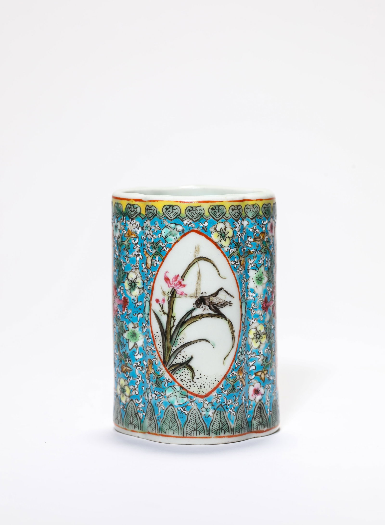 A Famille-Rose 'Floral and Poem' Brush Pot: A Famille-Rose 'Floral and Poem' Brush Pot Dimensions: Length: 5.7 cm (2.24 in) x Width: 5.3 cm (2.09 in) x Height: 8.2 cm (3.23 in). All measurements are approximate.