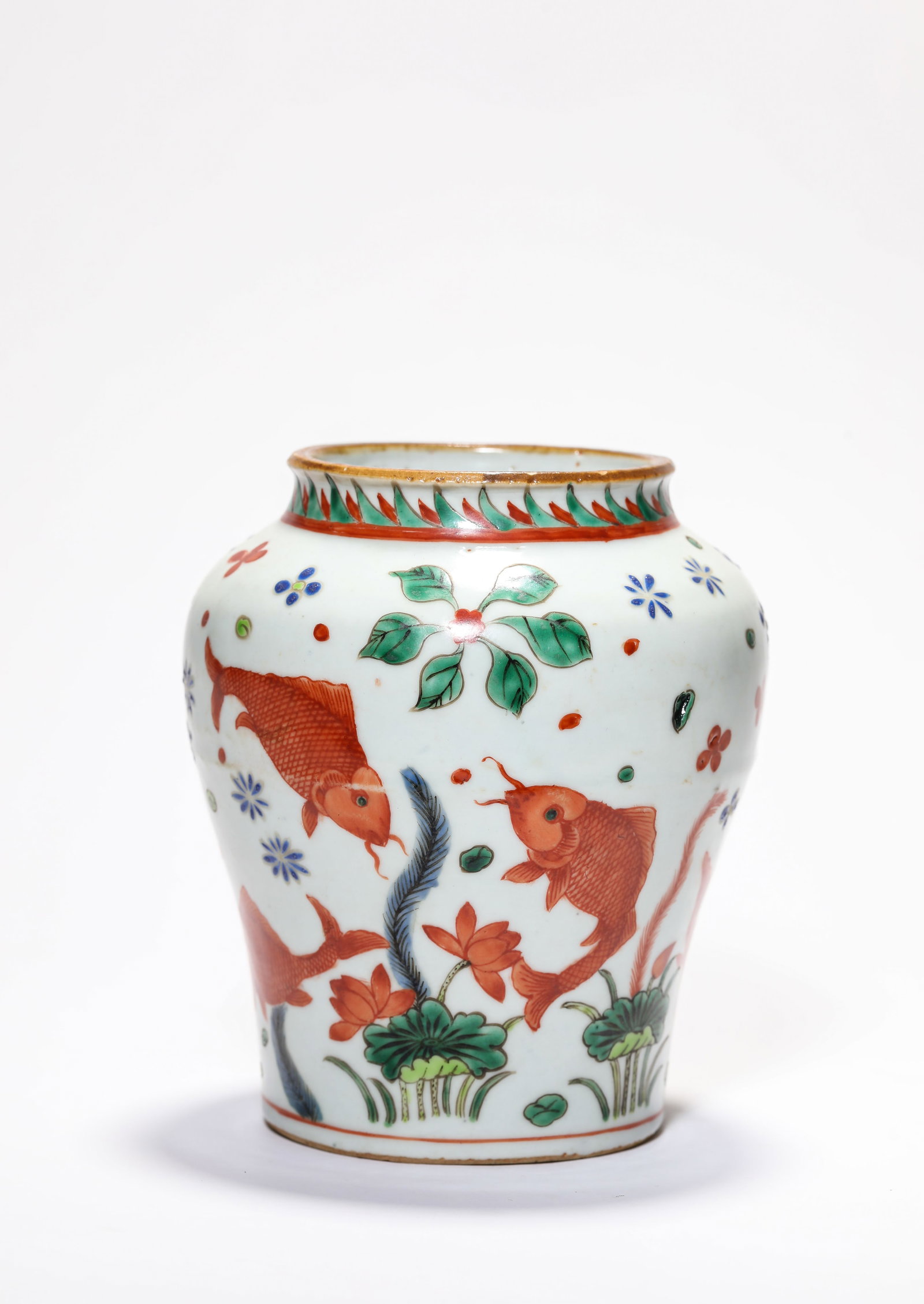 A Wucai 'Lotus Pond' Jar: A Wucai 'Lotus Pond' Jar Dimensions: Width: 12.3 cm (4.84 in) x Height: 14.2 cm (5.59 in). All measurements are approximate.