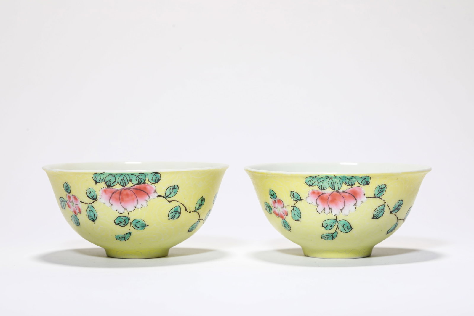A Pair of Yellow-Ground 'Floral' Bowls: A Pair of Yellow-Ground 'Floral' Bowls Dimensions: Width: 9.2 cm (3.62 in) x Height: 4.4 cm (1.73 in). All measurements are approximate.