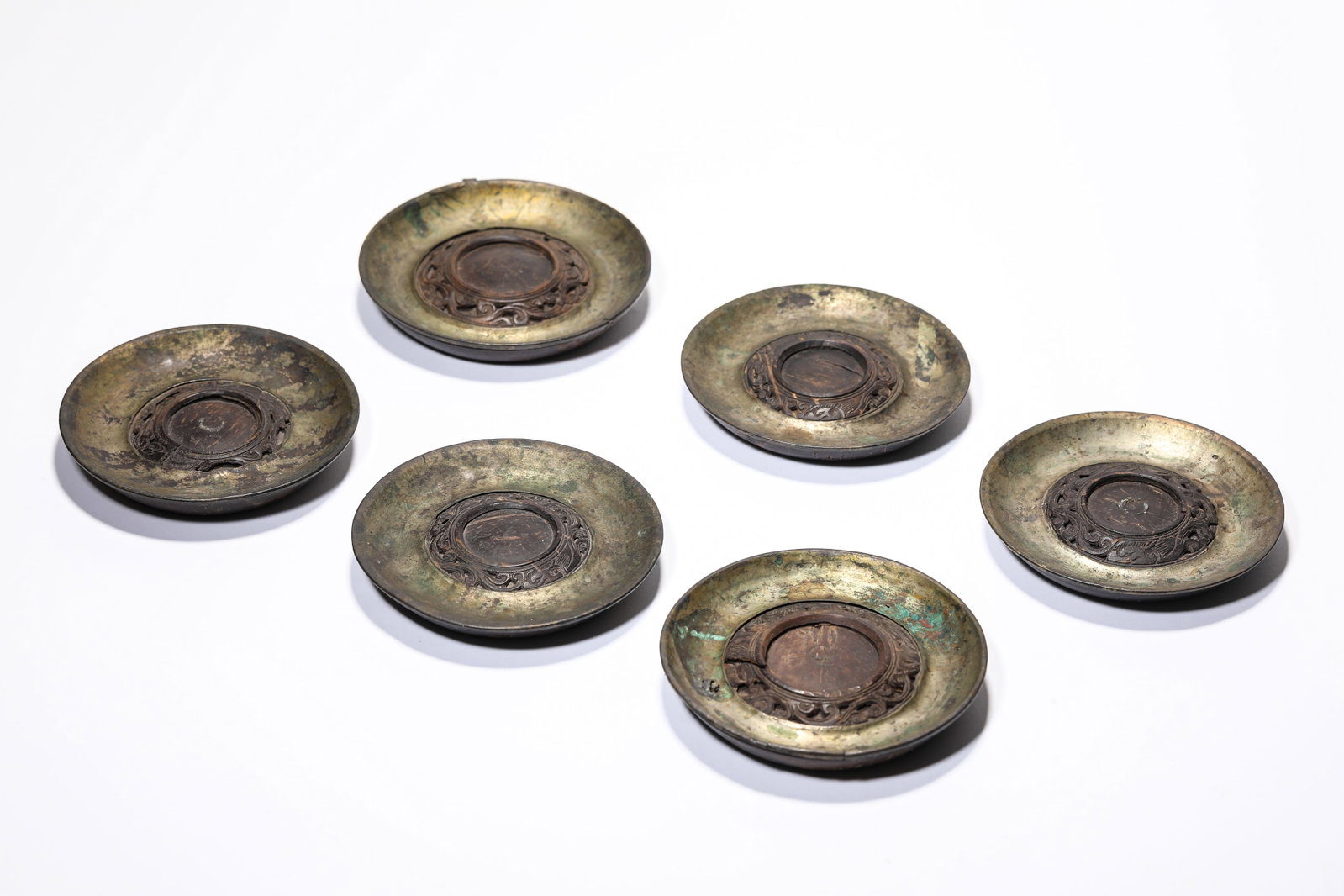 A Group of Wood Tea Cup Stands: A Group of Wood Tea Cup Stands Dimensions: Width: 9.8 cm (3.86 in) x Height: 1.5 cm (0.59 in). All measurements are approximate.