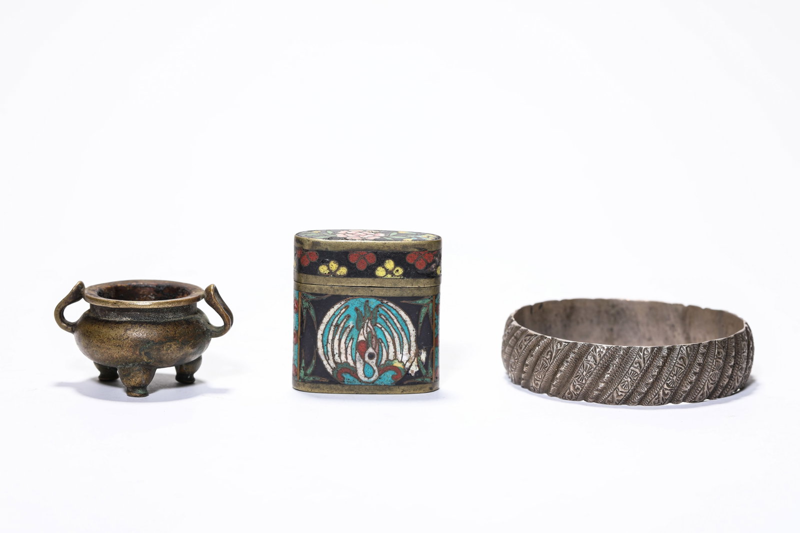 A Group of Bronze Ornaments: A Group of Bronze Ornaments Dimensions: Weight: 187g. Width: 7.2 cm (2.83 in) x Height: 5.0 cm (1.97 in) x Height: 3.7 cm (1.46 in) x Height: 3.0 cm (1.18 in). All measurements are approximate.