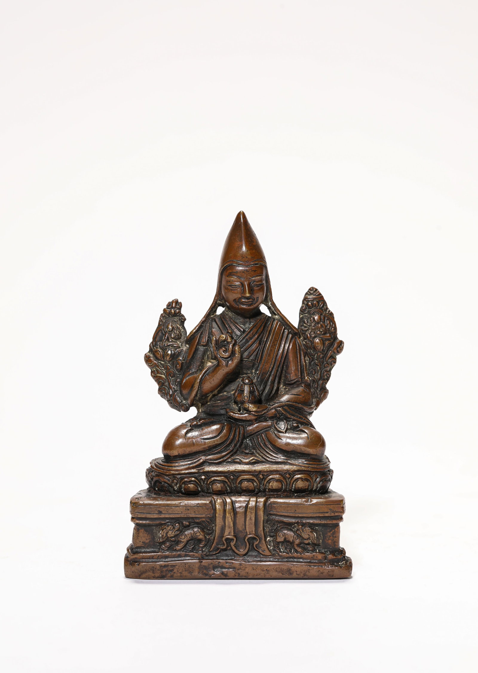 A Bronze Figure of a Lama: A Bronze Figure of a Lama Dimensions: Weight: 219g. Length: 6.0 cm (2.36 in) x Width: 3.6 cm (1.42 in) x Height: 9.5 cm (3.74 in). All measurements are approximate.