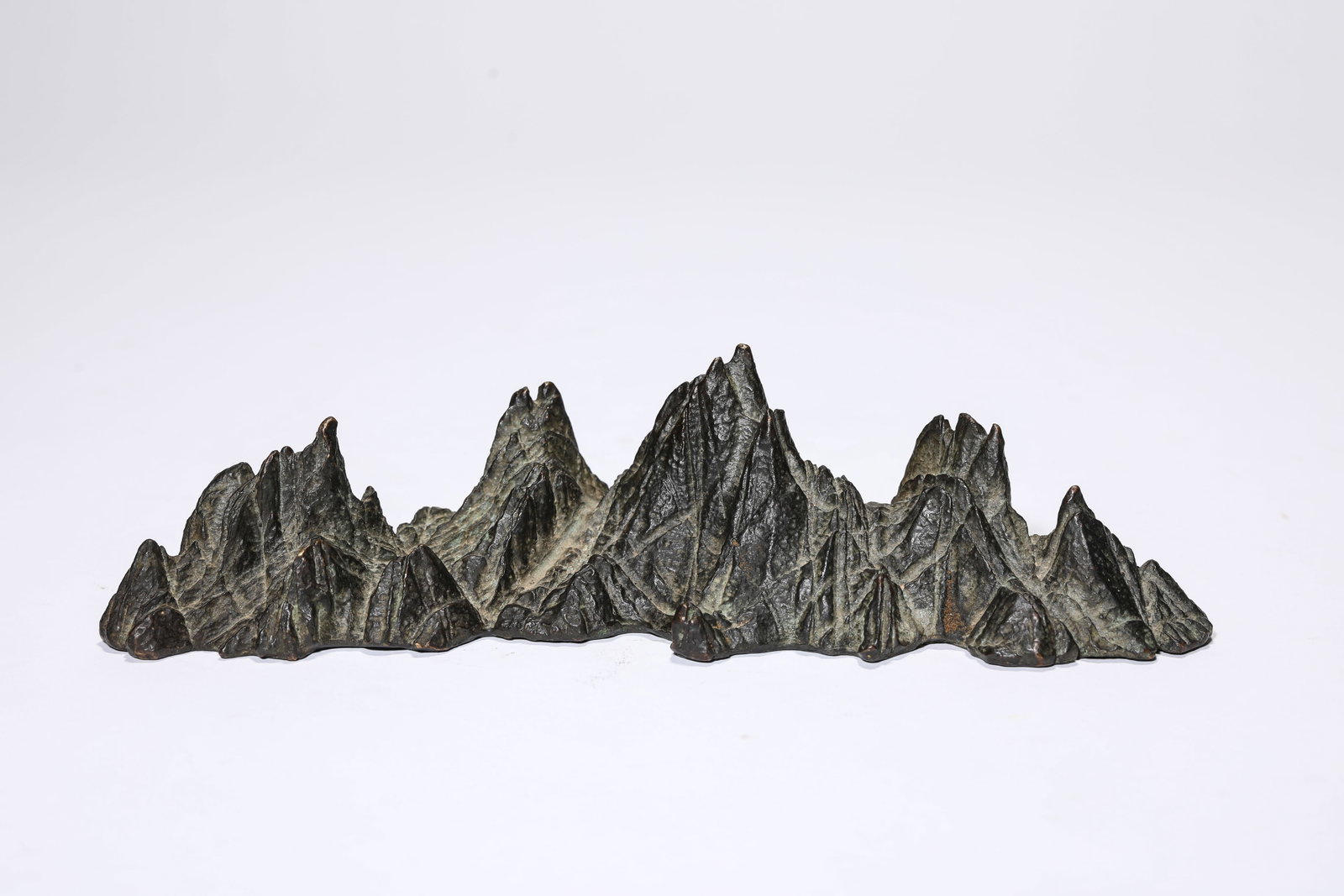 A Bronze 'Mountain' Brush Rest (1 of 5)