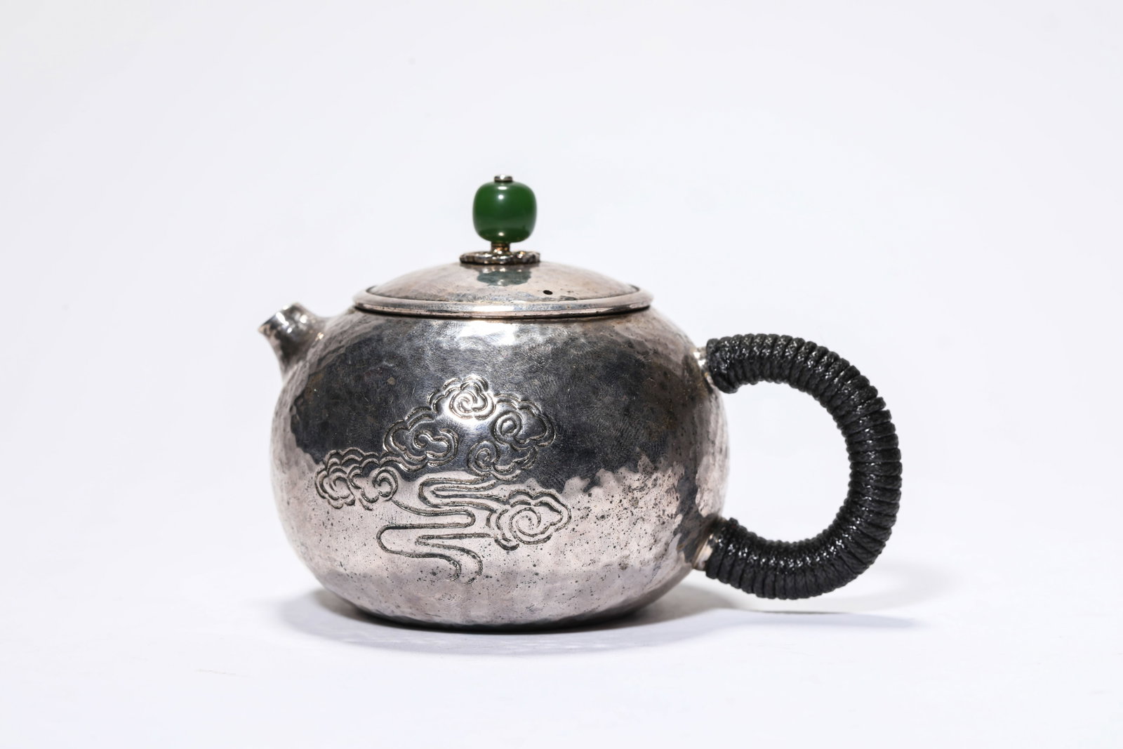 A Silver Pot: A Silver Pot Dimensions: Weight: 196g. Length: 11.6 cm (4.57 in) x Width: 8.1 cm (3.19 in) x Height: 7.7 cm (3.03 in). All measurements are approximate.