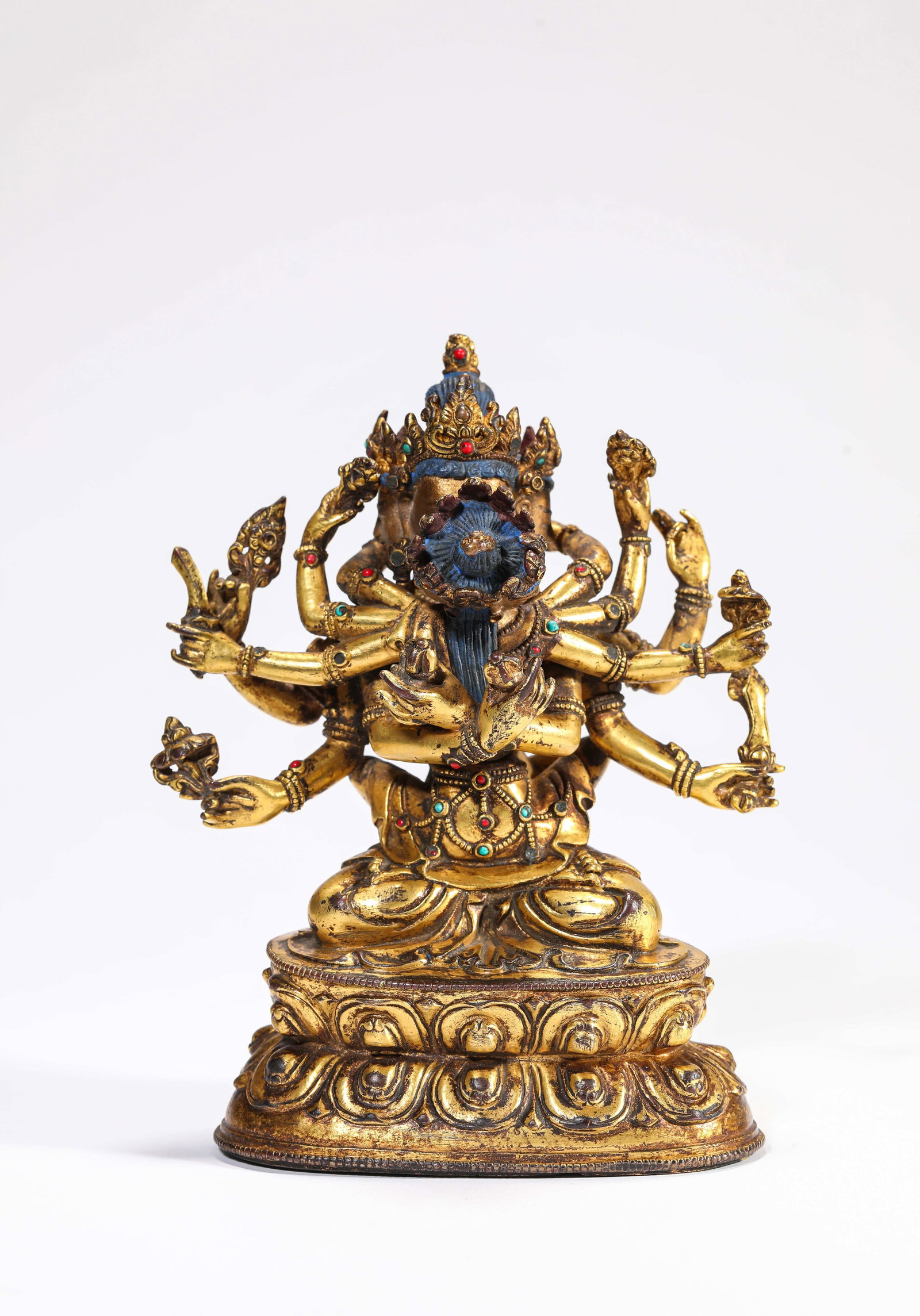 A Gilt-Bronze Figure of Guhyasamaja: A Gilt-Bronze Figure of Guhyasamaja Dimensions: Weight: 900g. Length: 11.5 cm (4.53 in) x Width: 6.1 cm (2.40 in) x Height: 14.5 cm (5.71 in). All measurements are approximate.