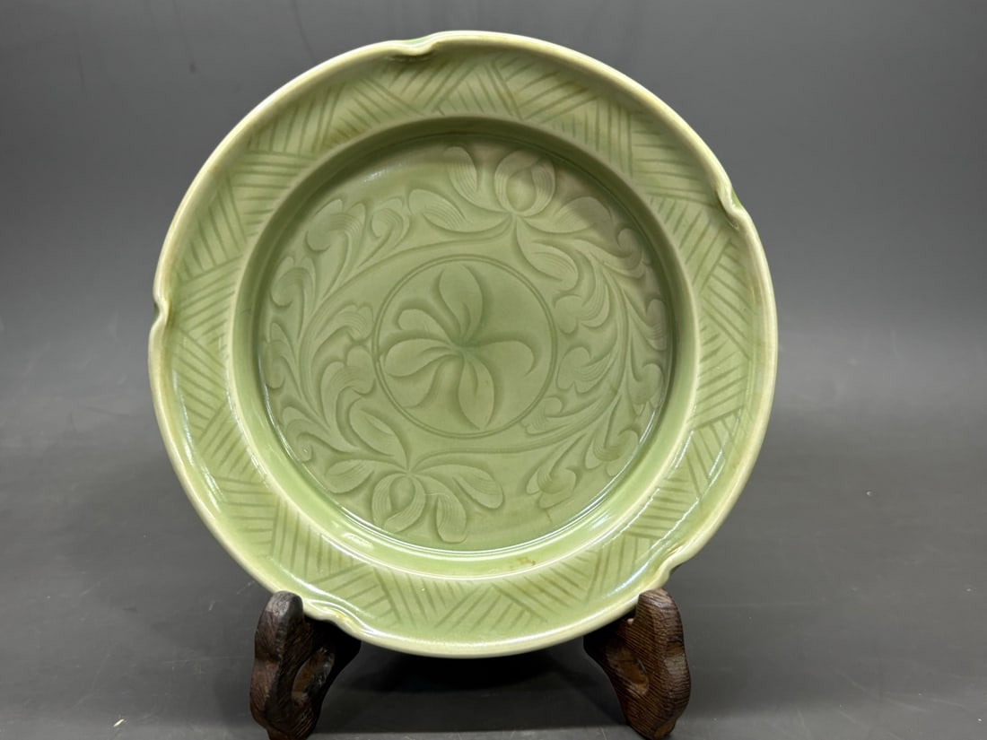 A Longquan-Type 'Floral' Dish: A Longquan-Type 'Floral' Dish Dimensions: Width: 14.7 cm (5.79 in) x Height: 3.7 cm (1.46 in). All measurements are approximate.