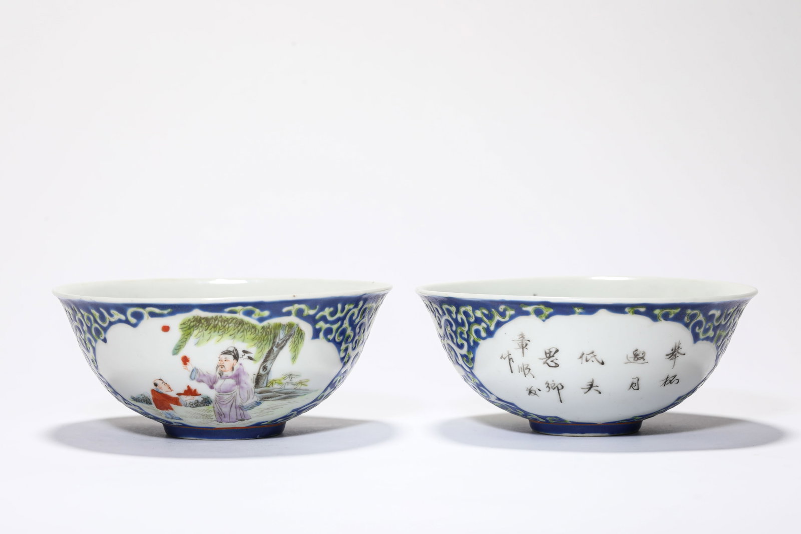 A Pair of Blue and White and Famille-Rose 'Figural and Poem Reserves' Bowls: A Pair of Blue and White and Famille-Rose 'Figural and Poem Reserves' Bowls Dimensions: Width: 12.6 cm (4.96 in) x Height: 5.3 cm (2.09 in). All measurements are approximate.