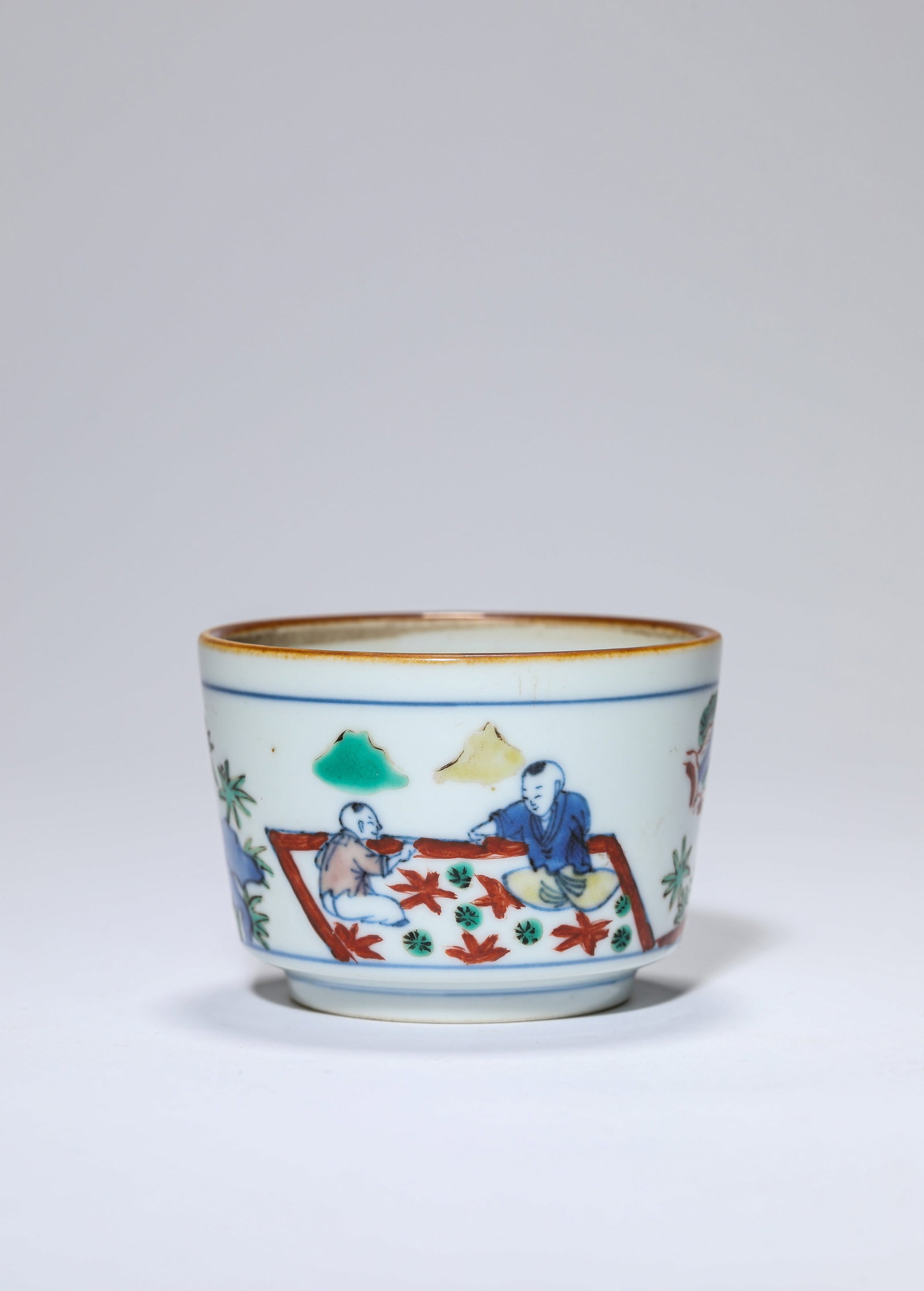 A Blue and White and Wucai 'Children at Play' Censer: A Blue and White and Wucai 'Children at Play' Censer Dimensions: Height: 5.0 cm (1.97 in) x Width: 7.0 cm (2.76 in). All measurements are approximate.